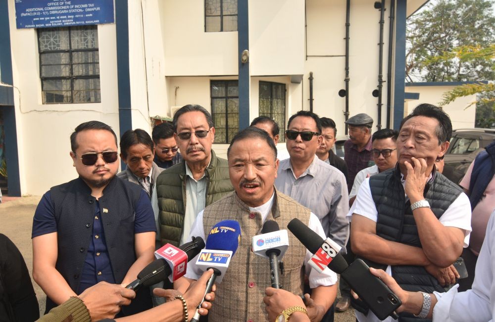 NPCC President Supongmeren Jamir speaks to the media on Monday during a silent protest outside the Income Tax office in Dimapur against the freezing of INC bank account by the Income Tax department. (Morung Photo)